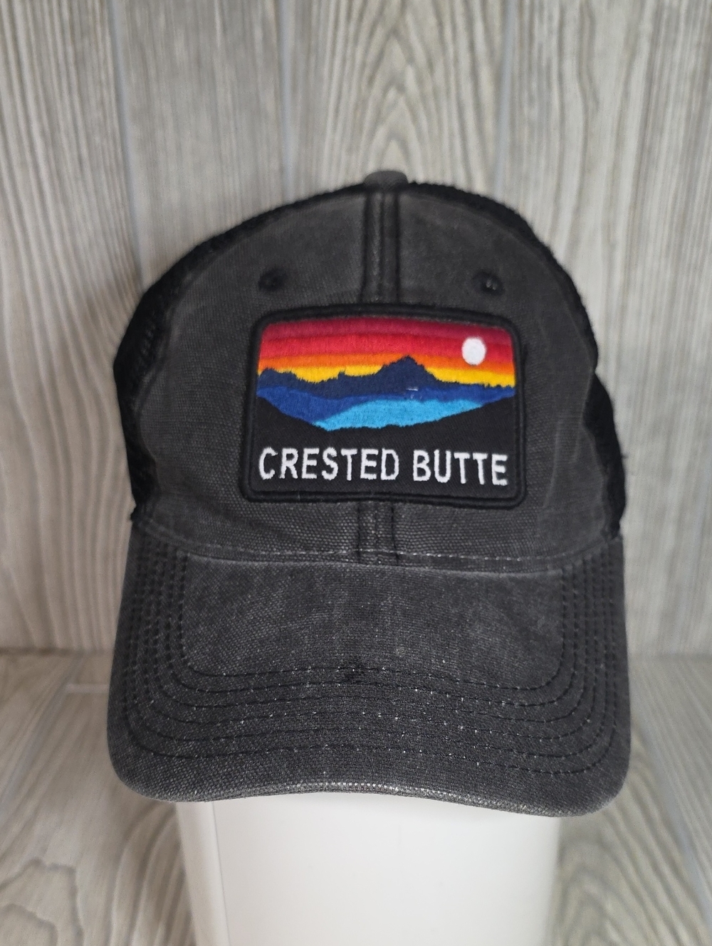 Legacy Crested Butte Faded Black Retro Style Trucker Hat With Patch